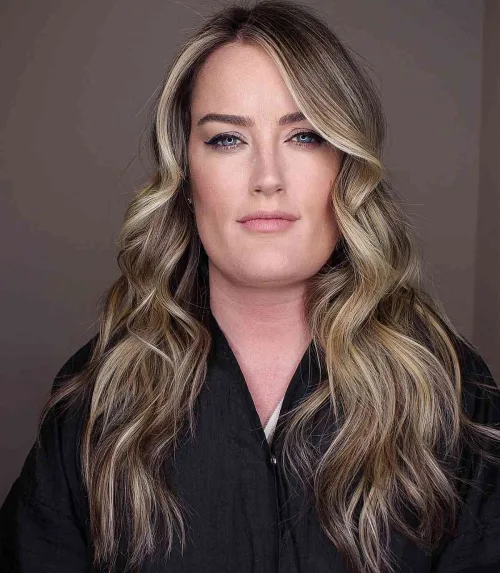 Side-Parted Hair with Subtle Layers and Highlights Over 40