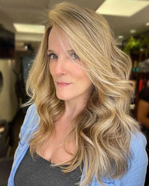 Side-Swept Hair with Wavy Layers Over 40