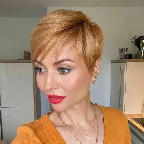 Honey Blonde Pixie Cut with Side-Swept Bangs Over 40